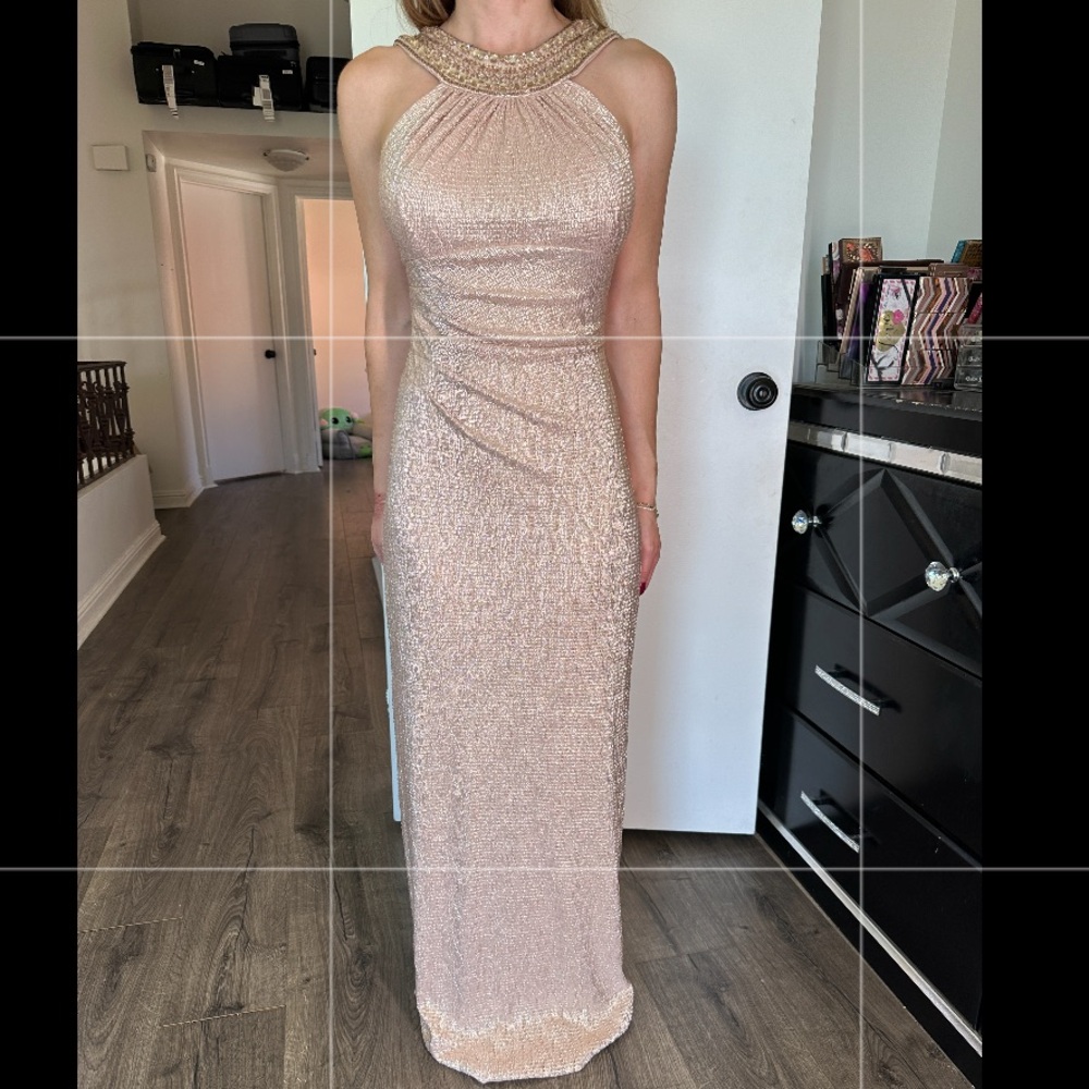 Xscape champagne/ rose gold formal dress. Size 4

Wedding / Special Ocassion